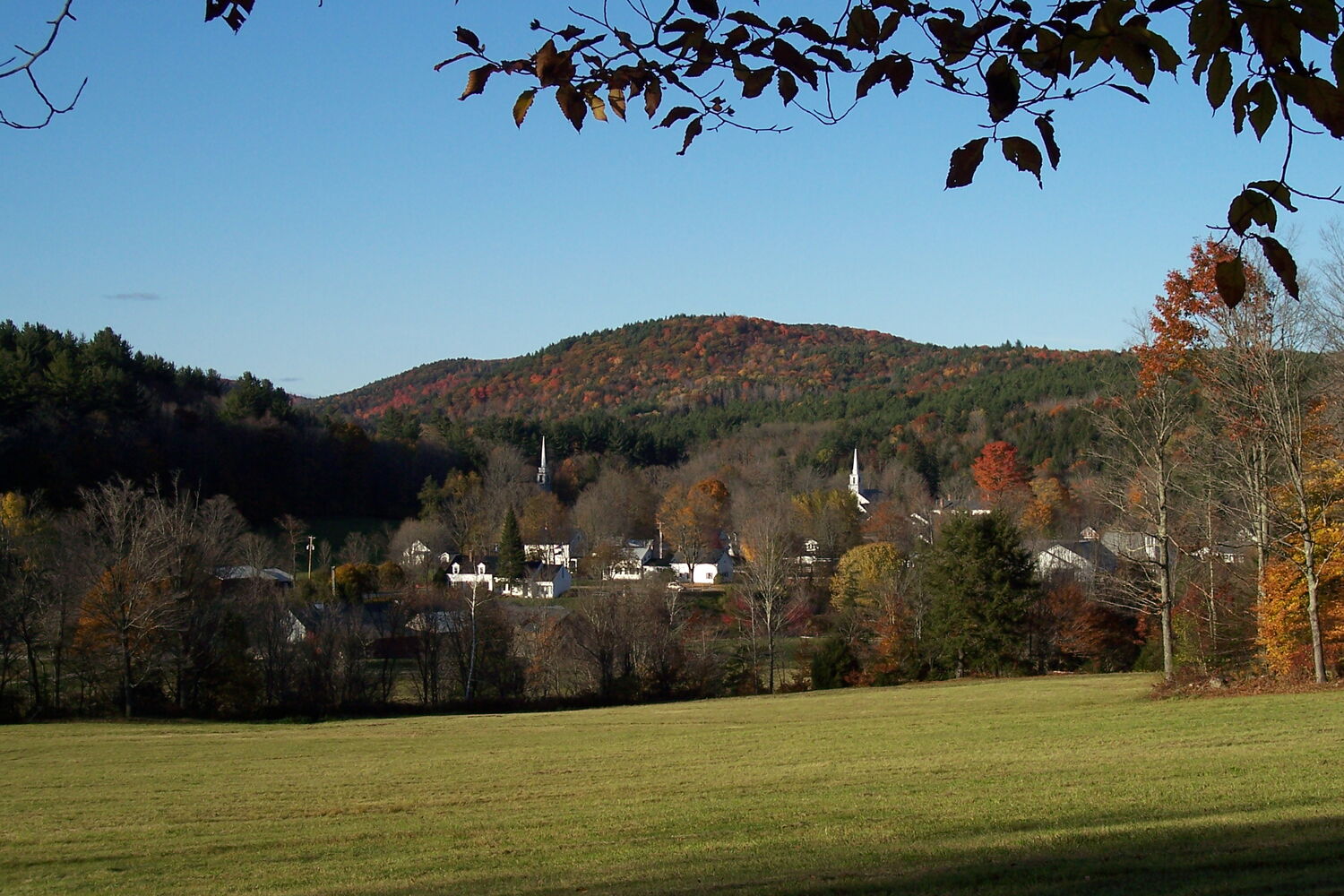 A historic village center with tree-lined streets